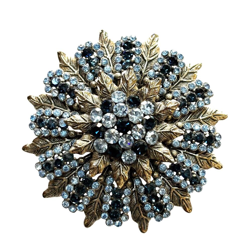 Vintage round silver leaf motif brooch lite & dark blue rhinestones domed 1950's